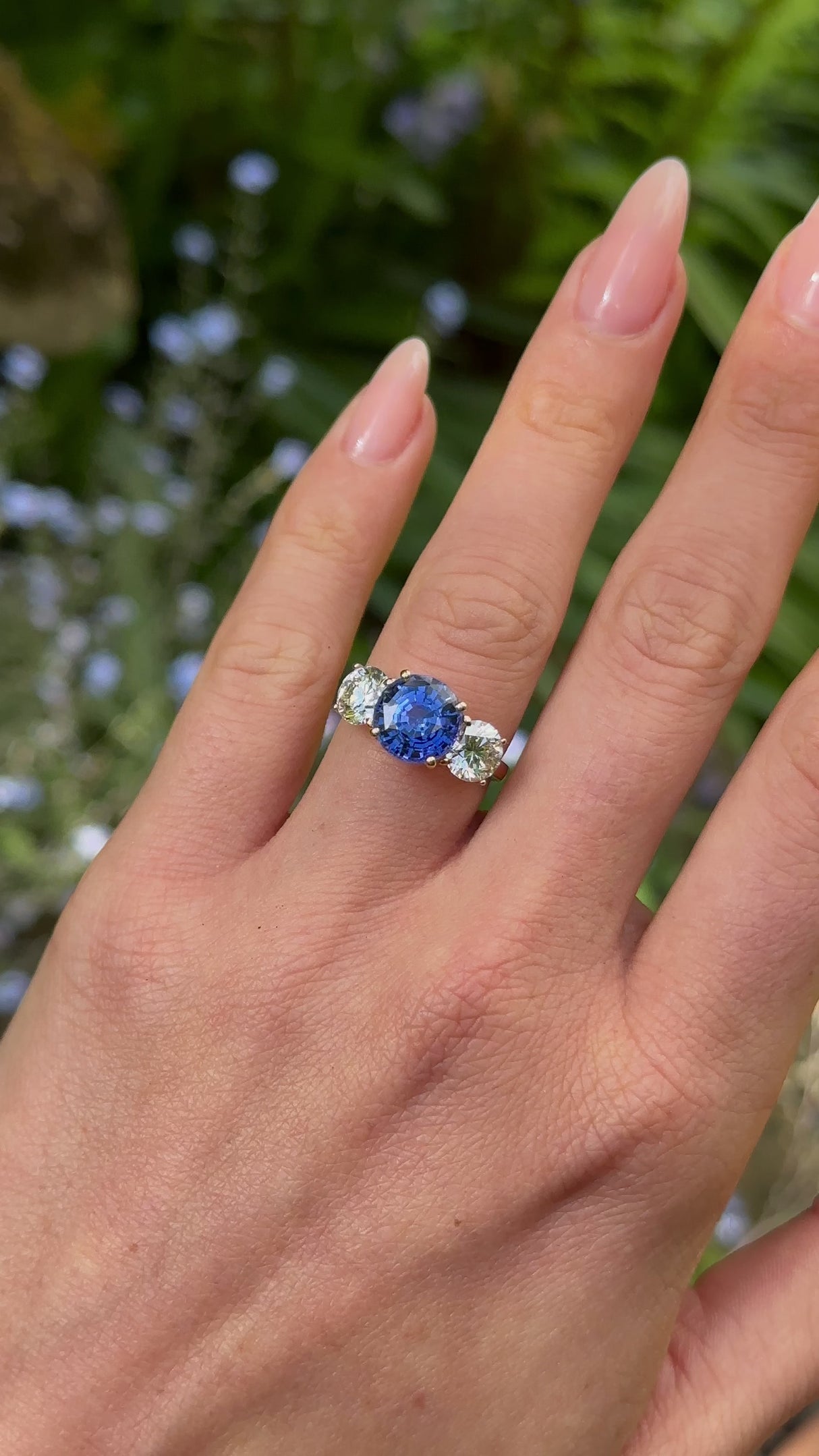 Vintage, 4ct Sapphire and Diamond Three-Stone Engagement Ring worn on hand.