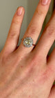 Antique, Edwardian tinted yellow diamond daisy cluster ring