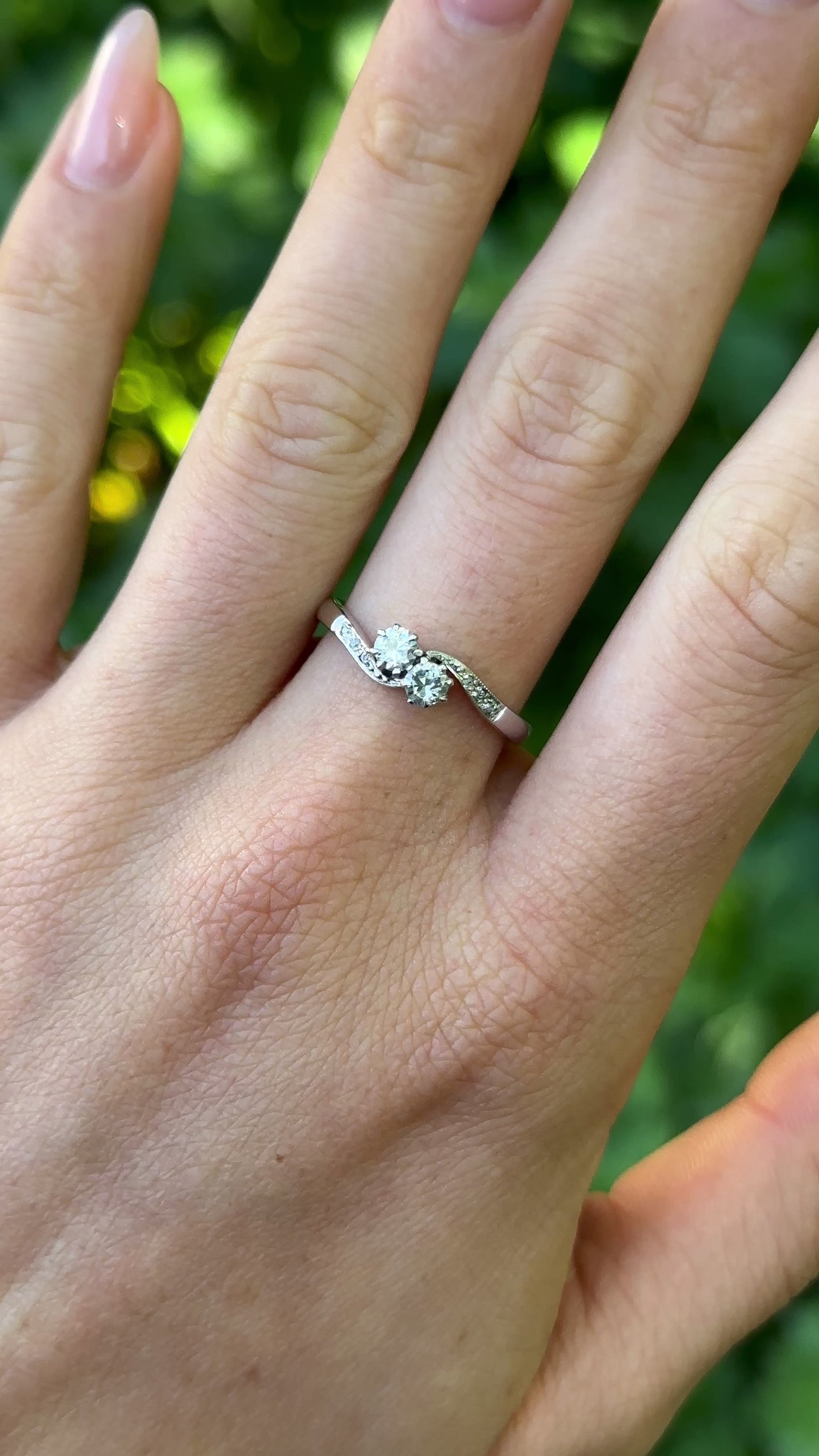 Antique, Edwardian Toi et Moi Diamond Engagement Ring, 18ct White Gold worn on hand.