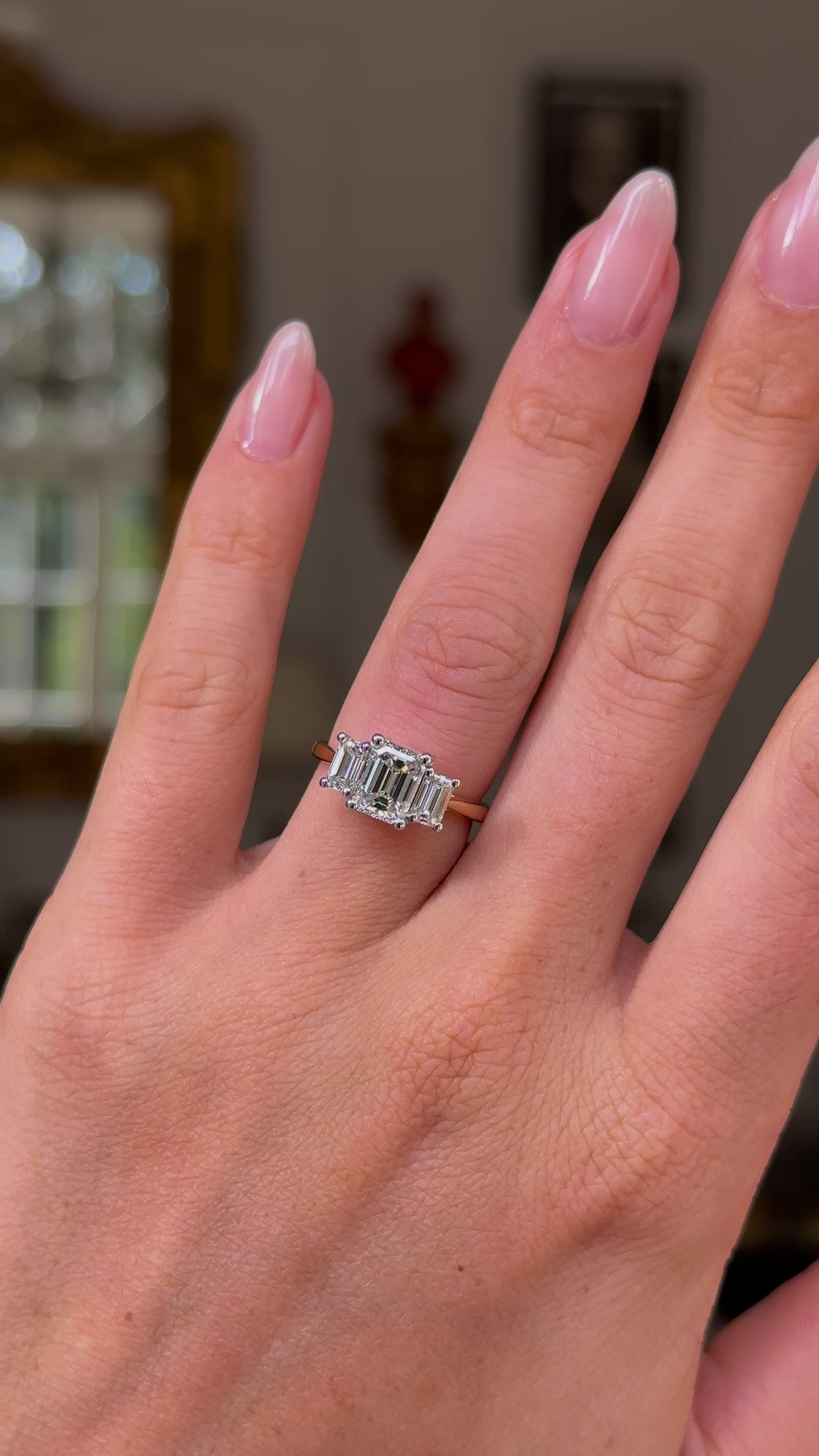 3 carat emerald cut diamond ring online on finger