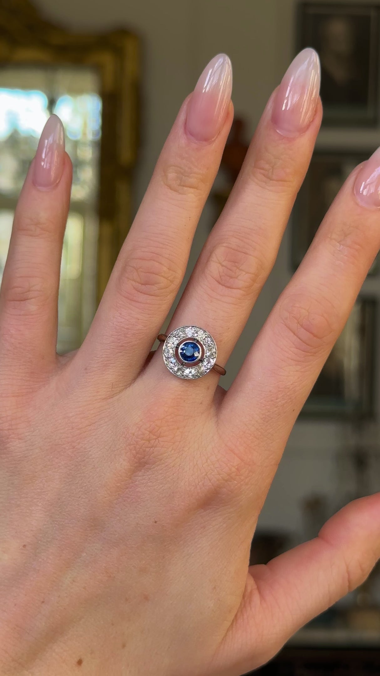 Vintage, 1930s Sapphire and Diamond Target Engagement Ring, 18ct Yellow Gold worn on hand and rotated to give perspective.