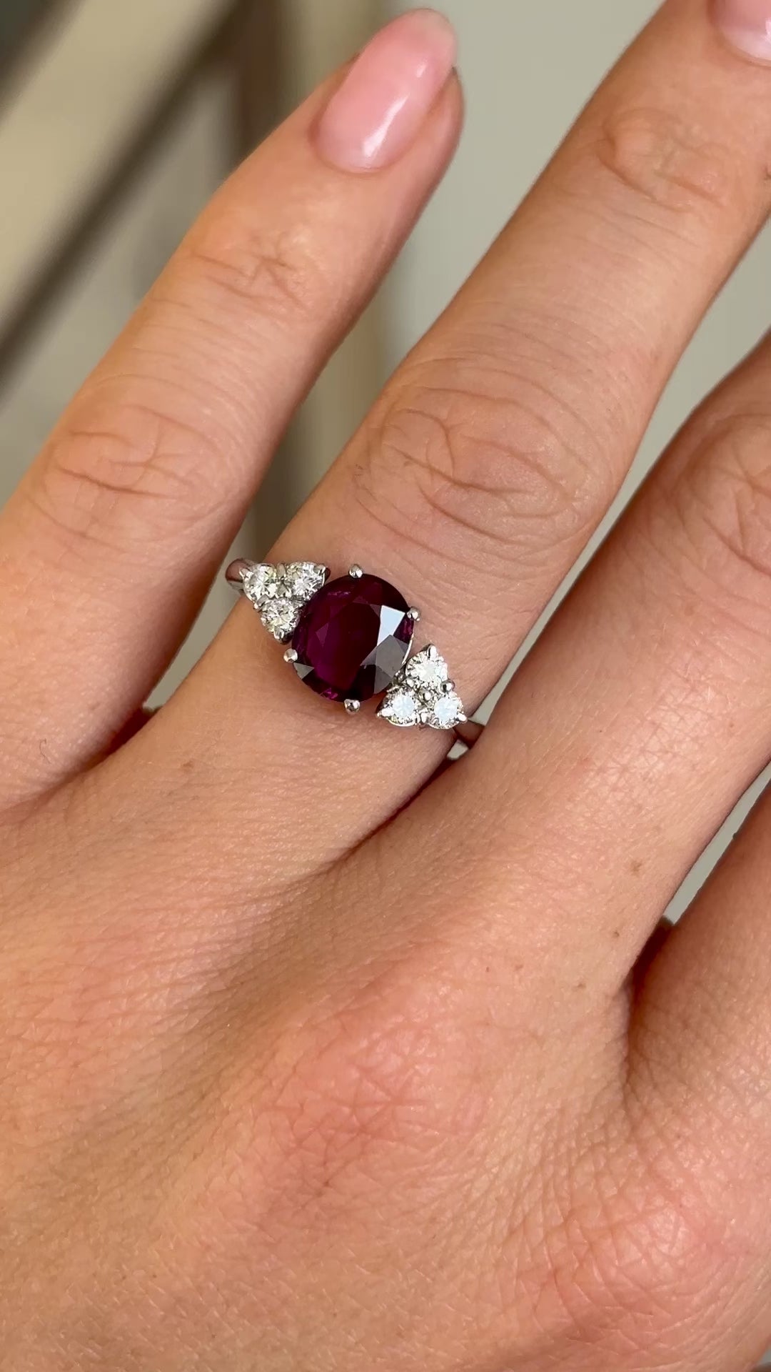 Vintage, 1980s ruby & diamond ring worn on hand.