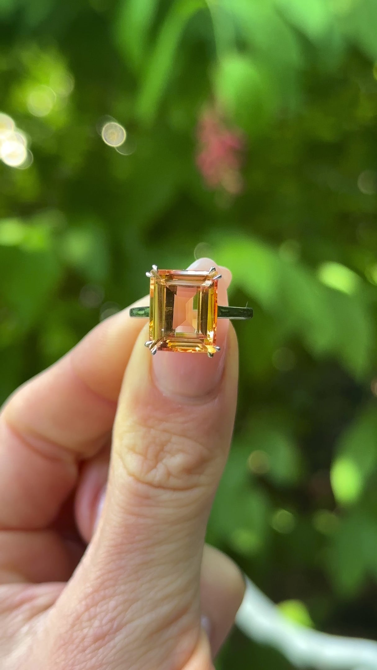 Vintage, Imperial Topaz Single-Stone Ring, 18ct White Gold held in fingers.