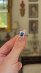 Antique, Art Deco, emerald-cut blue sapphire and diamond cluster ring, platinum