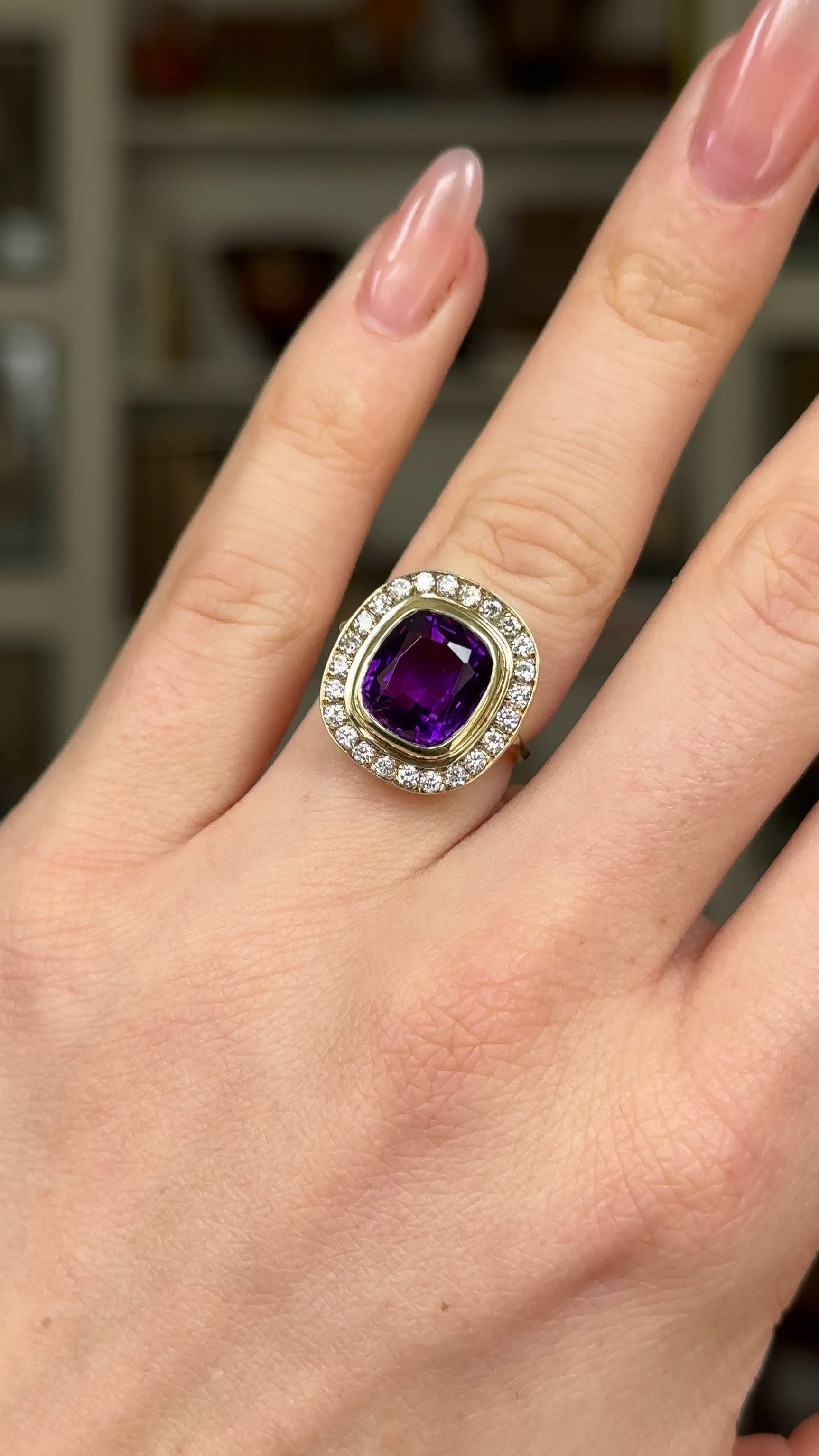 Vintage, 1970s Amethyst and Diamond Cluster Ring, 18ct Yellow Gold worn on hand and rotated to give perspective.