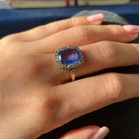 Early Victorian sapphire and diamond engagement ring, worn on hand.