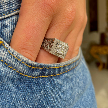 Art Deco diamond filligree band, worn on hand.