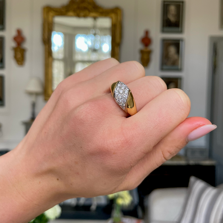 Asprey diamond and yellow gold band, worn on hand.