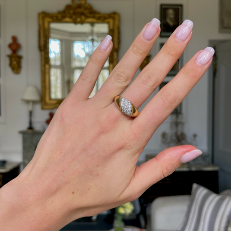 Asprey diamond and yellow gold band, worn on hand.