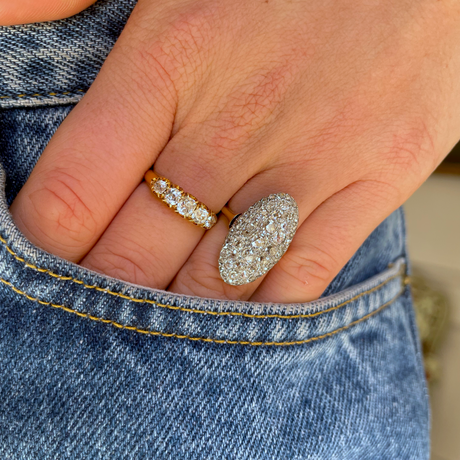 Victorian diamond panel navette ring, front view worn on hand.