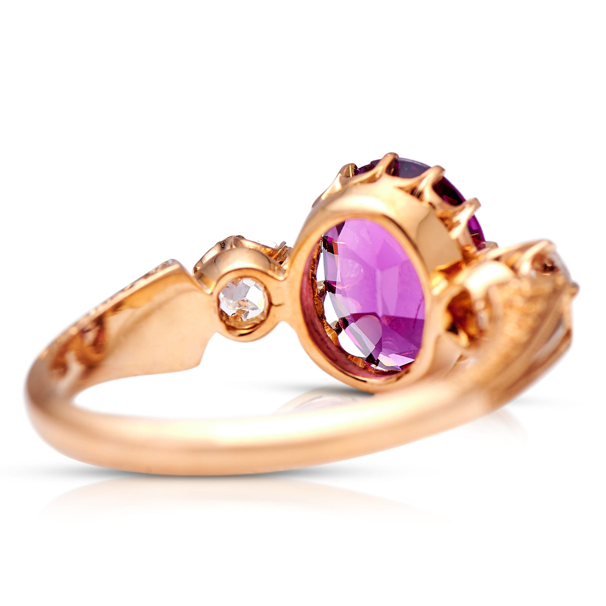 Edwardian, 18ct gold, magenta garnet and diamond ring