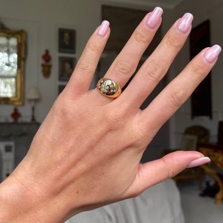 Vintage French diamond constellation ring, worn on hand.