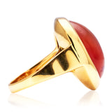 An impressive cabochon agate ring, set in 18ct gold