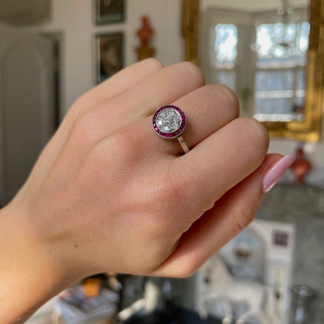 Art Deco ruby and diamond ring, worn on hand.