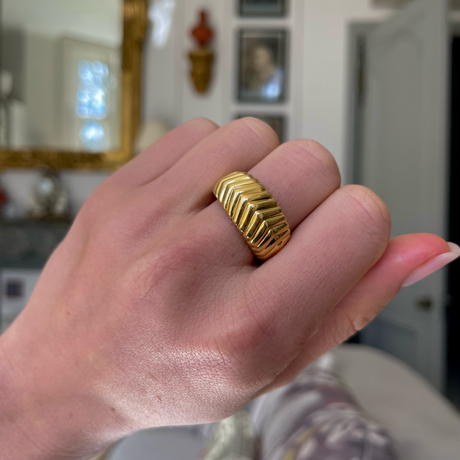 Vintage Tiffany&Co. yellow gold band, worn on hand.