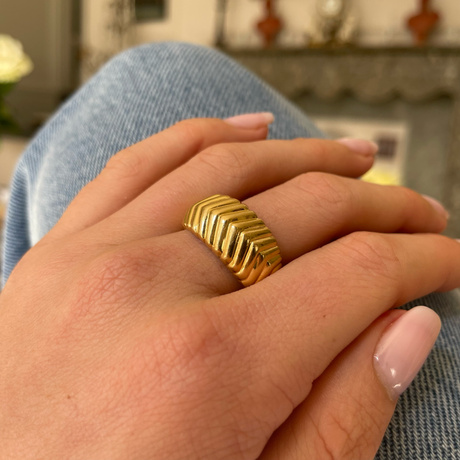 Vintage Tiffany&Co. yellow gold band, worn on hand.