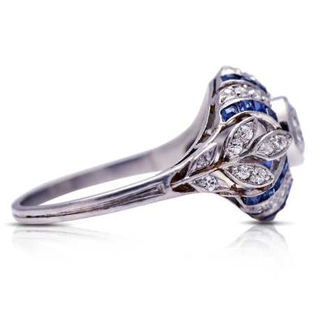 Untreated Antique Edwardian, Platinum, Sapphire and Diamond Bombé Ring